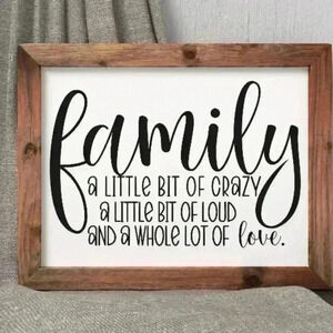 Family canvas sign framed bought from Etsy. White with black writing.